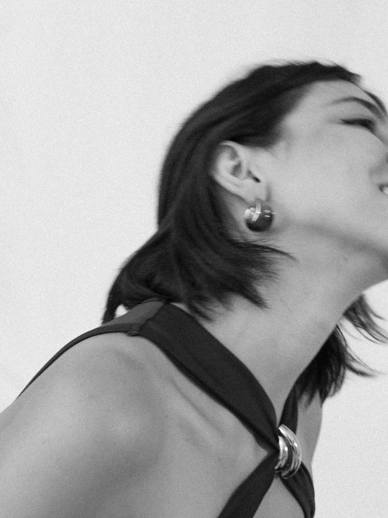 Portrait wearing sculptural jewelry